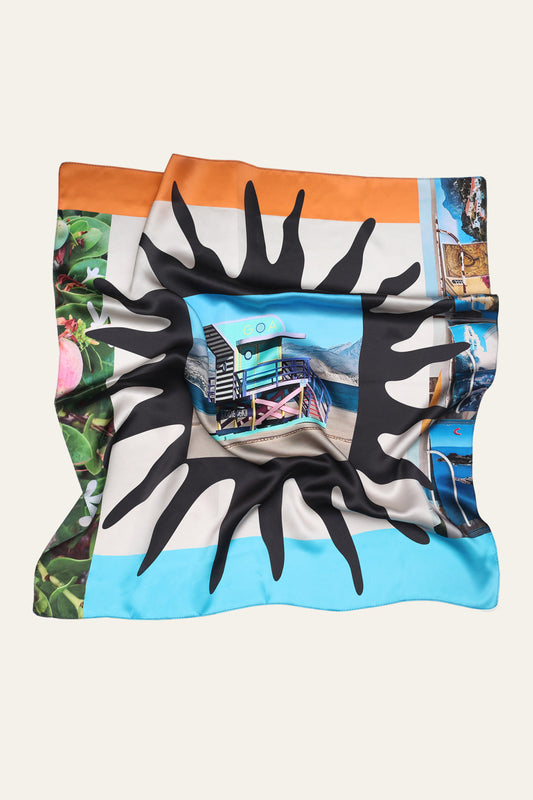GOA Studio’s 'Vacaciones' silk scarf – a lightweight, luxurious accessory featuring vibrant, painterly prints inspired by dreamy summer holidays. Jedwabna apaszka 'Vacaciones' od GOA Studio – lekki, luksusowy dodatek z barwnym, malarskim nadrukiem inspirowanym marzeniami o letnich wakacjach.
