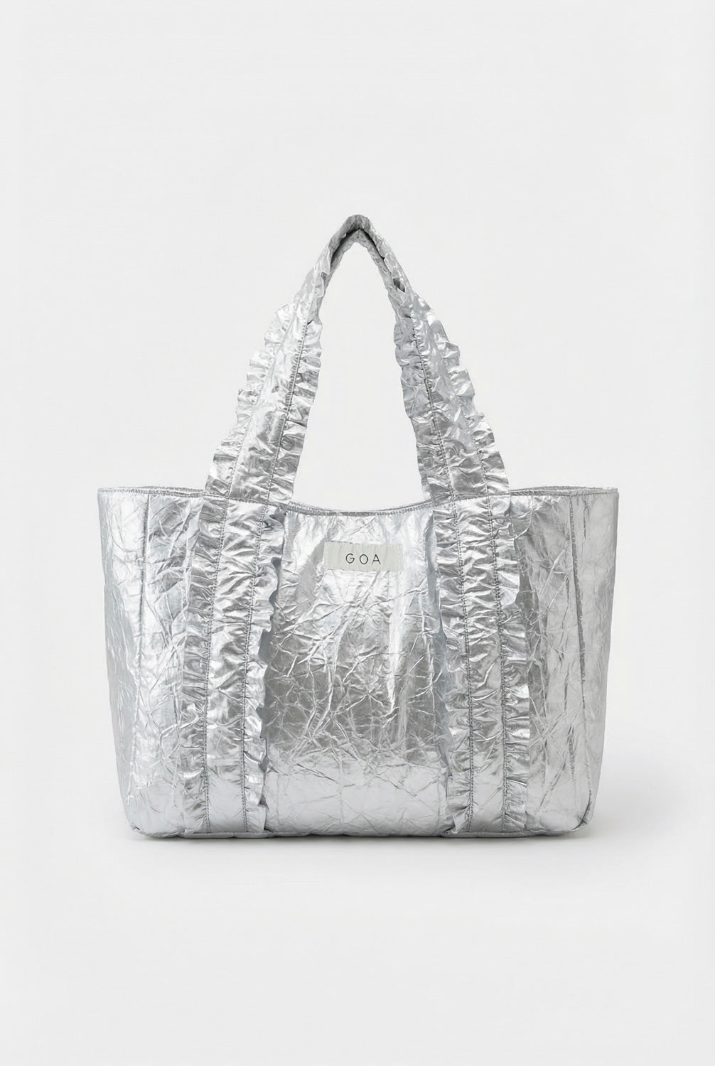 Metaliczna srebrna torba shopper z miękkim watowaniem i falbankami